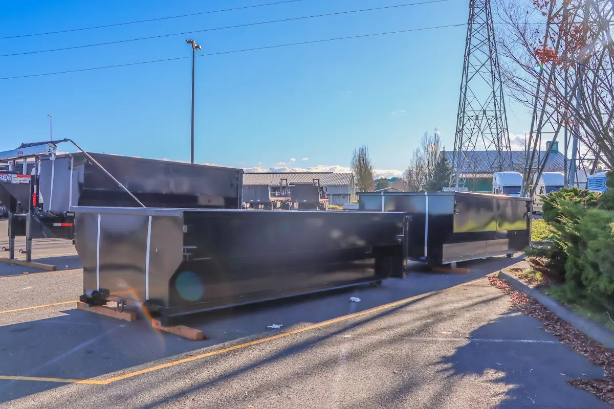 Roll-off dumpster ready for waste disposal at job site for Construction Dumpster Rental in Swansea